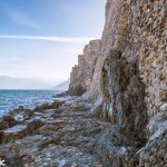 The fortess's sea walls blend effortlessly with the rocks below.